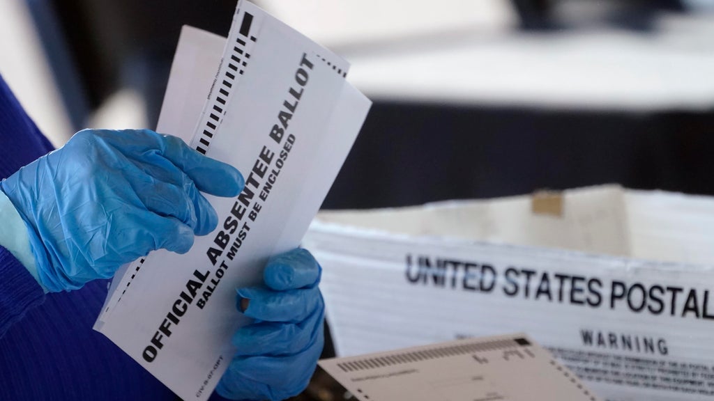 Absentee ballot issues may disenfranchise thousands of metro Atlanta voters, lawsuit claims — Canton Community news